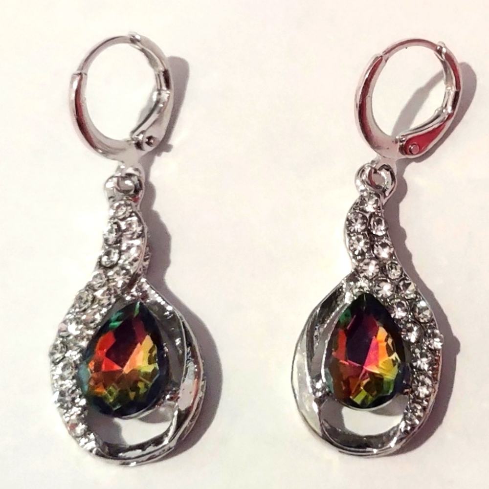 Silver tone metal earrings with Rhinestones . NEW.